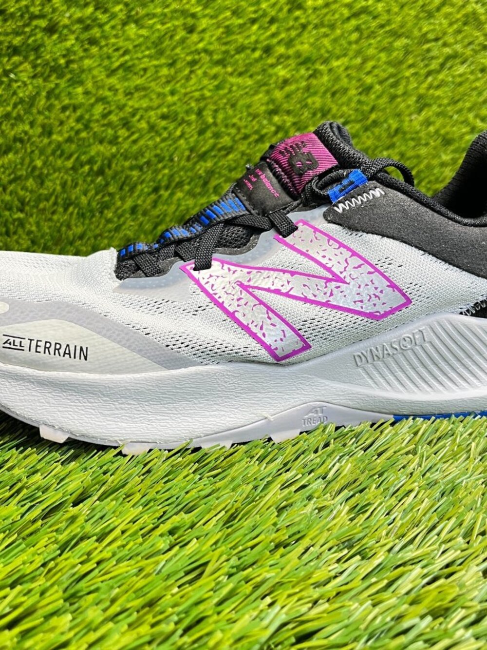New Balance Women's White, Black & Pink All-Terrain Sneakers - Picture 4 of 11